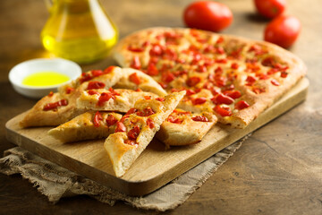 Traditional Italian focaccia bread with tomatoes