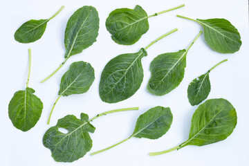 Collard green leaves with holes, eaten by pest. Organic Vegetable
