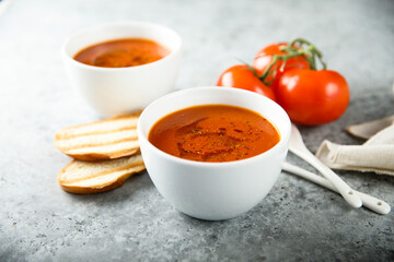 Homemade spicy tomato soup with grilled bread