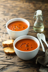 Homemade spicy tomato soup with grilled bread