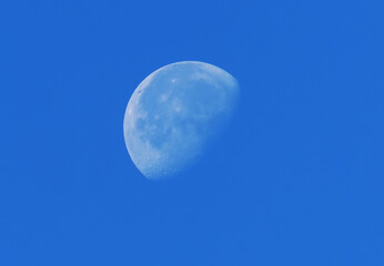 big moon against blue sky