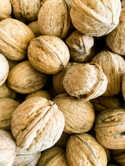 Walnuts on the market or harvest festival. Overhead view