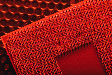 Close-up of a part of a microprocessor in soft focus under high magnification. Details of a computer component under a microscope.