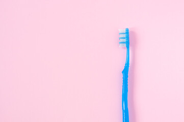 toothbrush on pink background