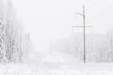 power line in the forest. Winter
