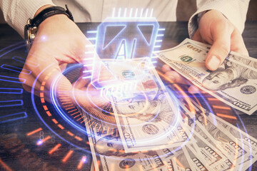 Double exposure of technology drawing hologram and us dollars bills and man hands. Data concept