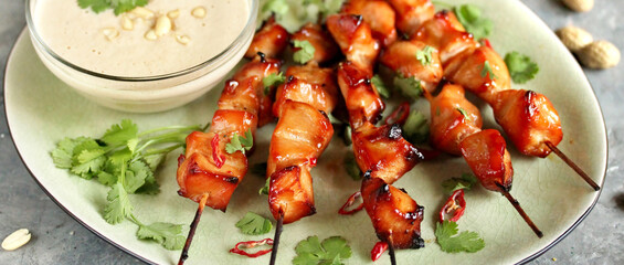Chicken Satay  with peanut sauce. Grilled chicken skewers served with peanut dipping sauce.
 Traditional Malaysian and Indonesian food.  