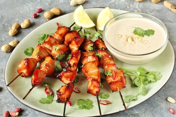 Chicken Satay  with peanut sauce. Grilled chicken skewers served with peanut dipping sauce.
 Traditional Malaysian and Indonesian food.  