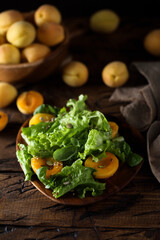 Fresh arugula salad with apricots