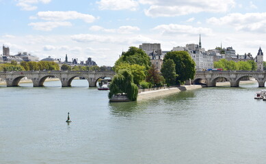 View of Seine River, Pont Neuf, Ile de la Cite and Square du Vert-Galant from Pont des Arts. Paris,...