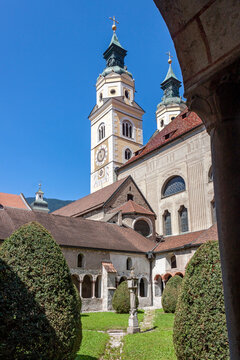 Artistic image of Brixen cathedral seen from old Romanesque cloister in South Tyrol, Italy 