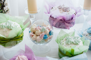 Beautiful Easter cakes on a decorated light table. A light holiday of Easter.