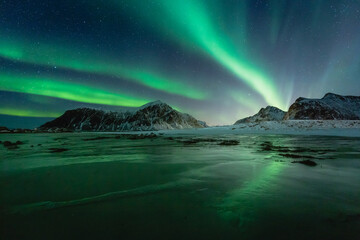 Fototapeta na wymiar Aurora Borealis in winter on Lofoten