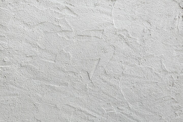 White painted stucco wall. Background texture