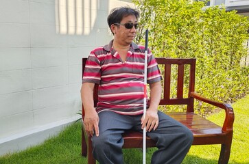 Men disabled blind ride alone on the chair.
