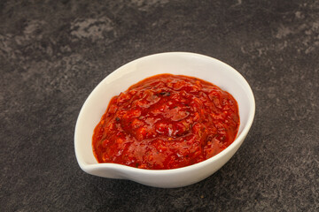 Tomato spicy sauce in the bowl