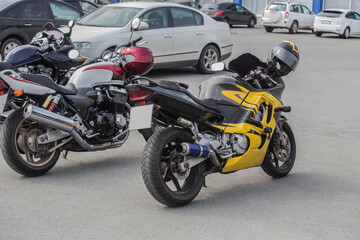 Fototapeta na wymiar Motorcycles on parking in the city