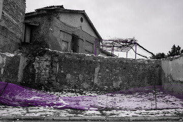 old abandoned houses with pink fence