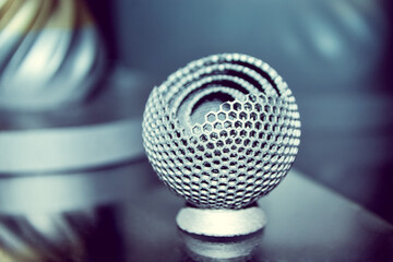 Object printed on metal 3d printer close-up.