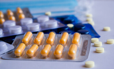 different medicine drugs, pills, tablets, capsules in blister packs
