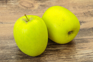 Two ripe green sweet apples