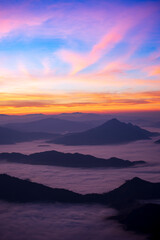 Obraz premium Landscape and starscape of the mountain and sea of mist in winter sunrise view from top of Phu Chi Dao mountain , Chiang Rai, Thailand