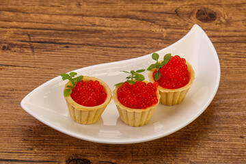 Apetizer - tartlet with red caviar