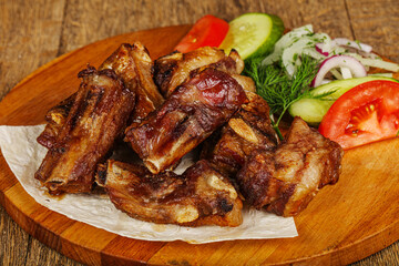 Grilled pork ribs barbeque with vegetables