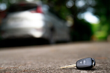 Lost fall car key On the street concrete. 
