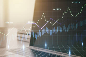Abstract creative financial graph on modern laptop background, forex and investment concept. Multiexposure