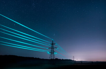 Electricity transmission towers with glowing wires against the starry sky. Energy concept. - obrazy, fototapety, plakaty
