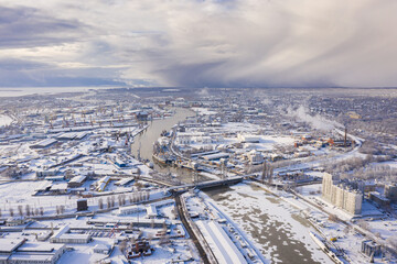 Aerial: The two-tier bridge in the background of the Kaliningrad port in the wintertime