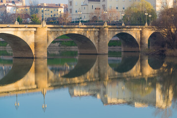 Stone bridge over the Ebro river in the city of Logroño (Spain).