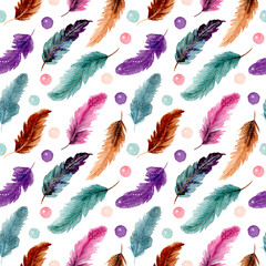 Seamless pattern of colorful watercolor feathers