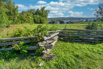 Fototapeta na wymiar Old split rail fence in a pastoral landscape.
