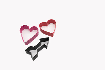  Heart shaped cookie cutters on white background for homemade cookies for Valentines Day. 