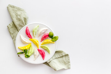 Steamed dumplings tio view. Vegetables ravioli on white plate