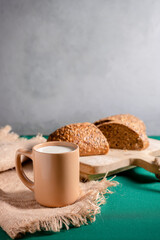 Milk in the glass. whole-grain bread. raw food. dairy products