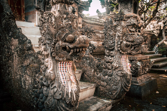 Traditional Balinese Sculpture At The Entrance Of A Hindu Religious Temple. Also Called Demons Of The Bali Temple.