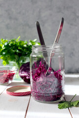 Red cabbage salad with pomegranate. Diet food. Top view with copy space.