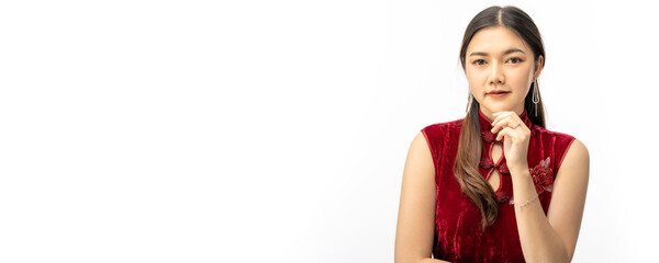  Young beautiful Chinese woman in traditional Chinese dress looking and smiling at camera on white background