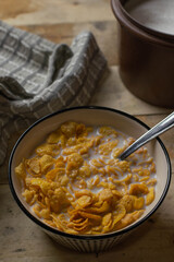 A bowl full off cereal and milk