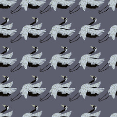 Seamless japanese pattern with light crane bird shapes. Dark grey background. Doodle simple design.