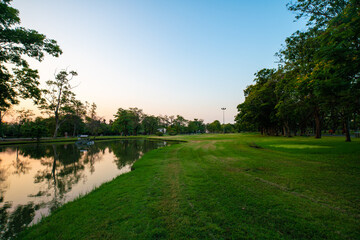 Green park sunset with pond park sky cloud nature landscape