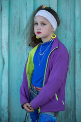 Little girl with bright makeup in retro style. Child model.