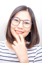 Beautiful asian glasses short hair women smiling face close up