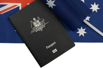 Australian Passport with the Southern Cross flag in the background. Travel, Border Control  and Immigration concept. 