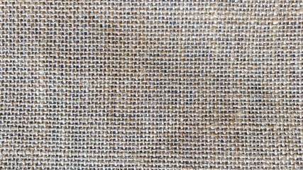 Burlap texture for background.  Natural gray fabric.  Flat lay, copy space, wallpaper.