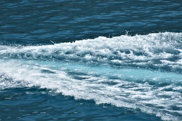 Waves of the sea trail with a foam