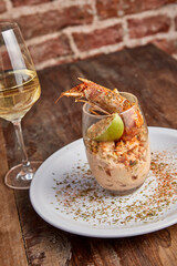 Shrimp Cocktail with a glass of wine.